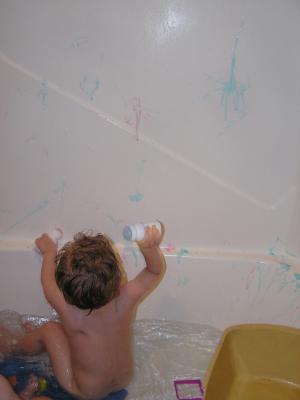 Noah paints with soap.