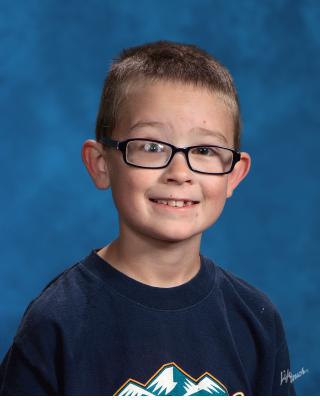 Noah's school picture for third.