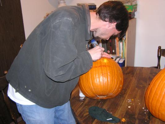 Myke carves up a pumpkin with his new dremel.