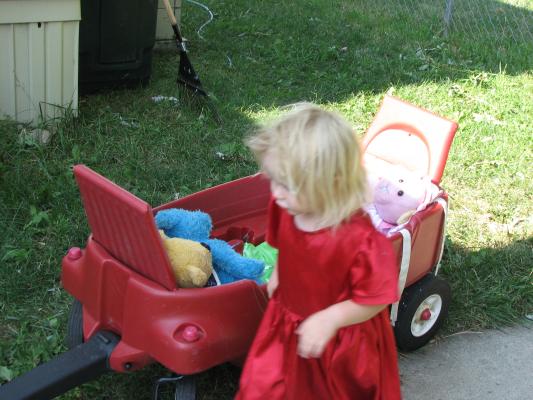 Sarah and her bears in the wagon.