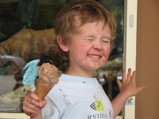 Noah making a funny face with ice-cream.