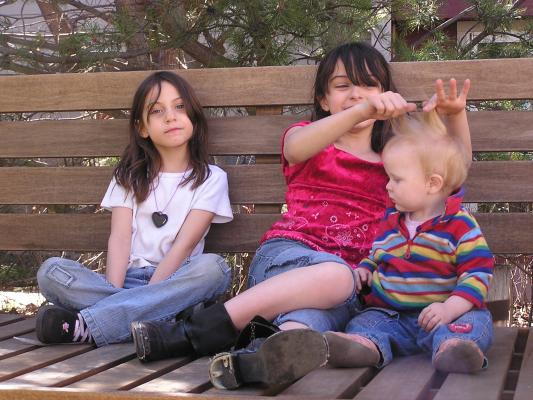 Andrea, Malia and Sarah on the bench.