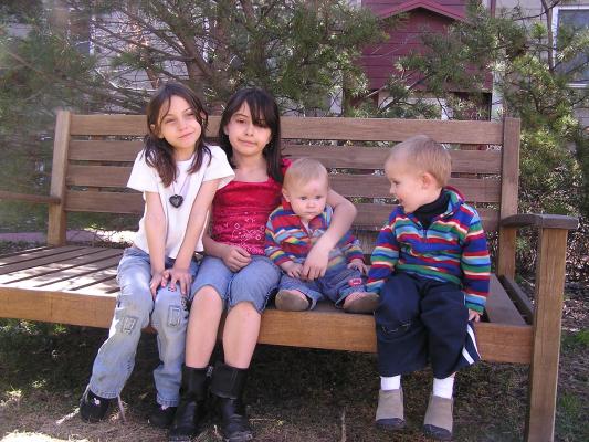 Andrea, Malia, Sarah and Noah on the bench.