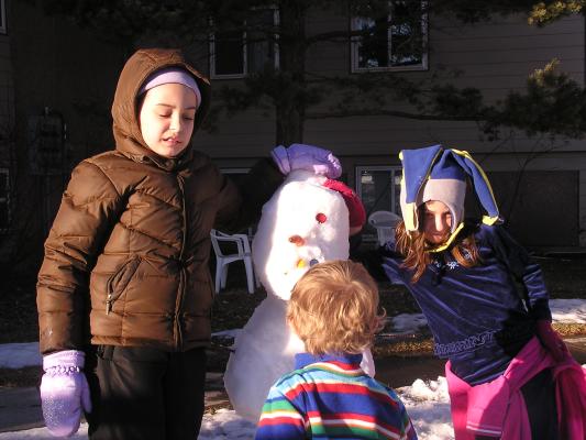 Malia, Noah, Andrea and the snow person.