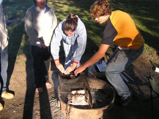 Christian Student Fellowship campout.
Cooking Breakfast.