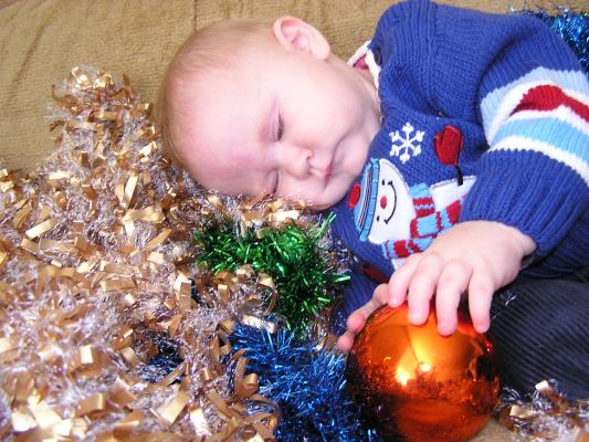 Maybe Sarah will take a nap with her Christmas ball.