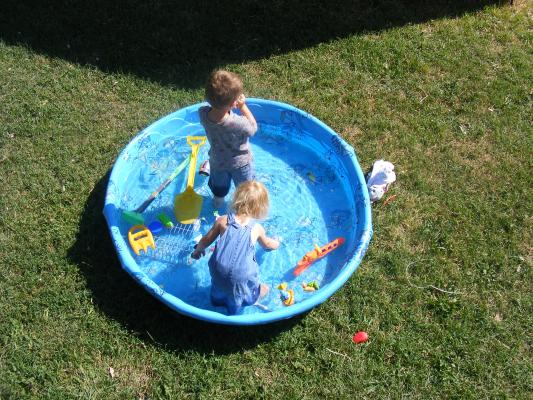 Noah and Sarah in their pool