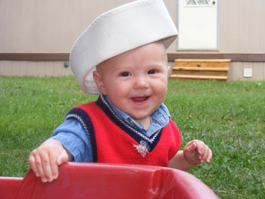 Joshua in a sailor hat.