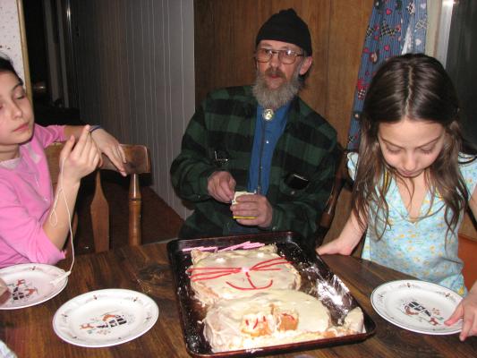 Malia, Robert and Andrea are ready for cake.
