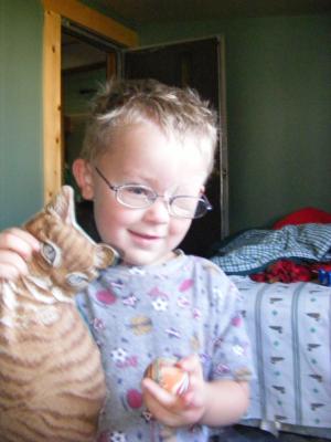 Noah with a toy cat.