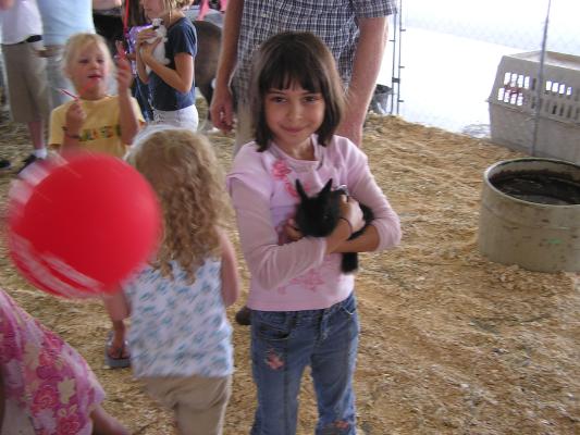 Malia holds a  bunny.