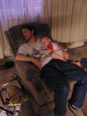David asleep with a sleepy baby Sarah