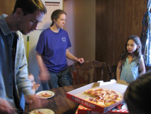 David, Katie, and Andrea eat pizza