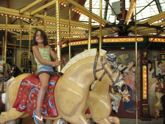Andrea on the Carousel horse.