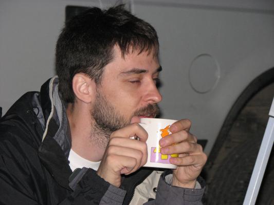 Mike drinks coffee