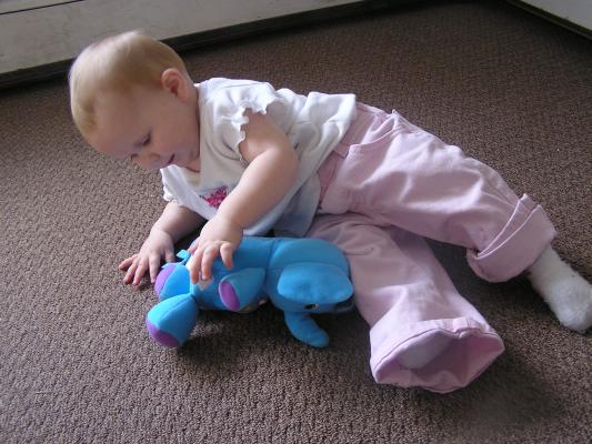 Sarah plays with her new elephant.