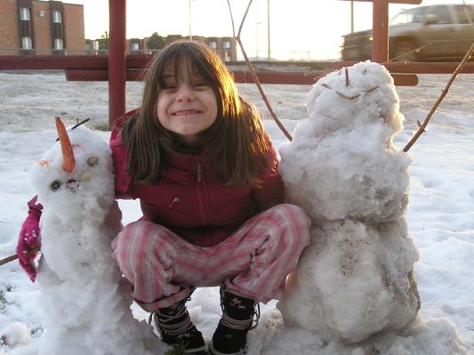 Andrea with Sarah and Noah snowman.