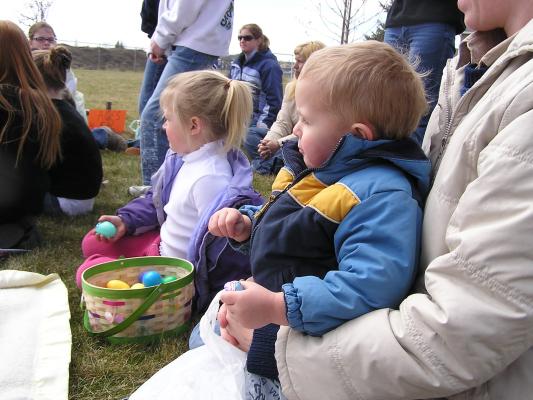 Kids listen to the story of Easter.