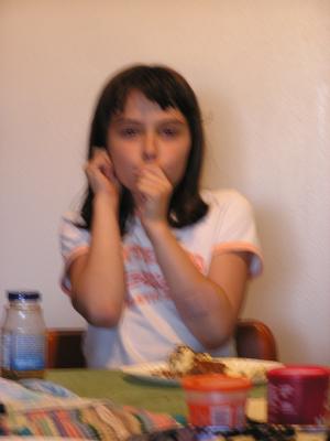 Malia eating cake.