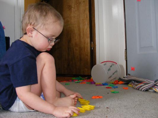 Noah  plays with his letters