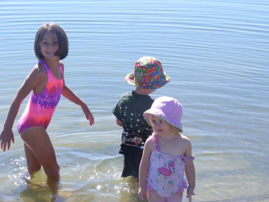 Andrea, Noah and Sarah swimming