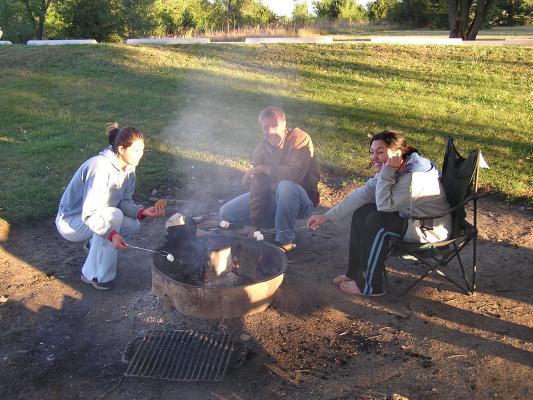 Christian Student Fellowship campout.
Toasting Marshmellows.