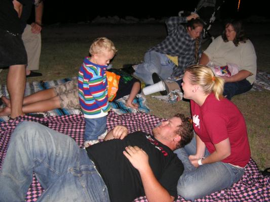 The Cline family at the fireworks show at the lake.