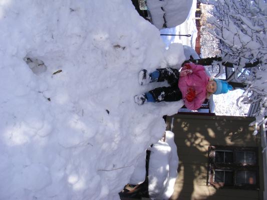 Sarah on the snow David shoveled up.