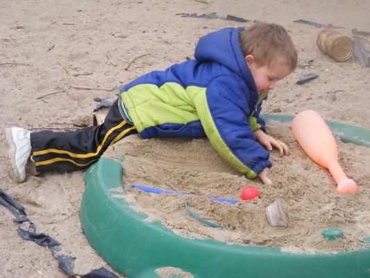 Noah digs in the sand