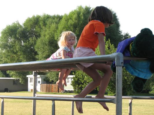 Sarah and Andrea on the monkey bars.