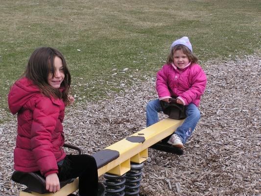 Kids play at the park before the Easter egg hunt.
